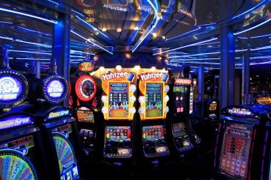 Live roulette table with betting interface overlay showing chip denominations and payout odds